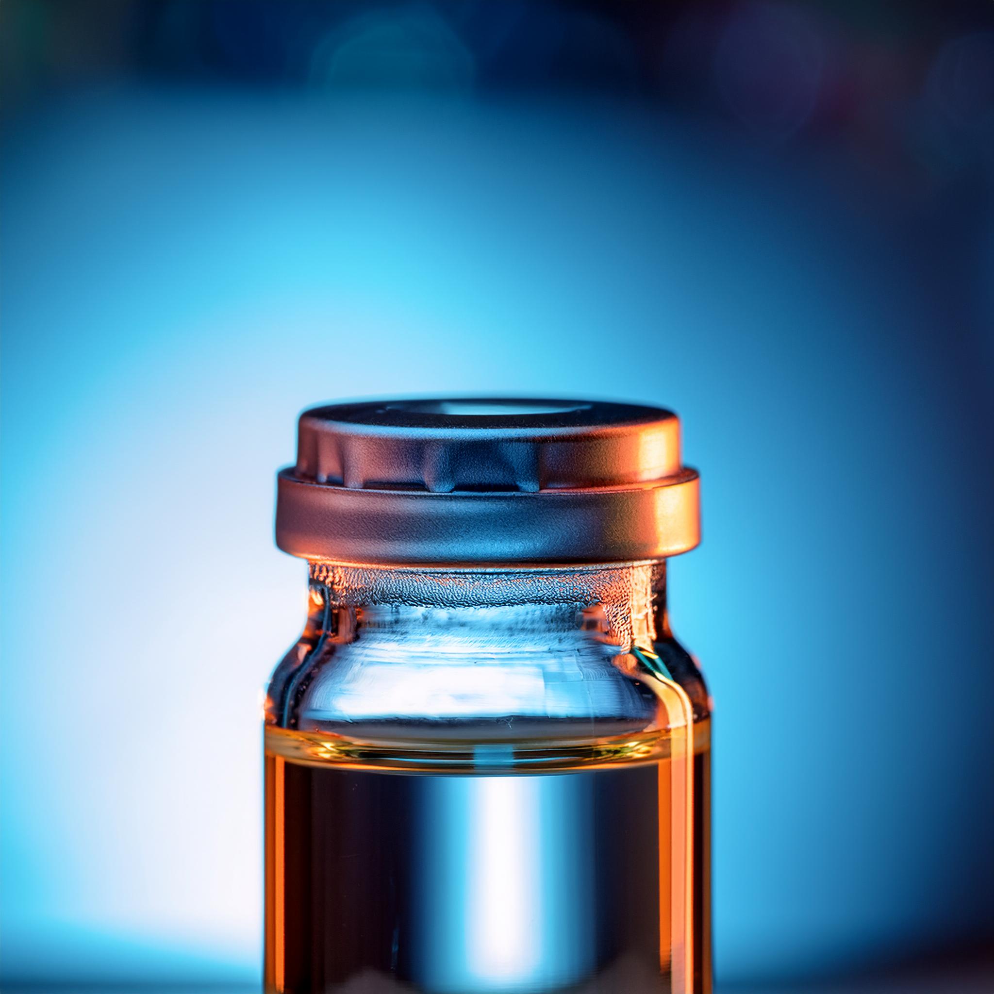 Firefly close up on a glass pharmaceutical bottle 96499